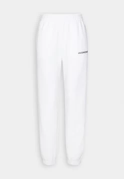 Lacoste Tracksuit Bottoms - White -Ladies Clothing Shop 28ab6d430f354bcf981af97bb407a71d